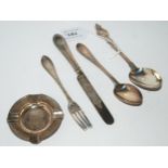 A lot comprising a three piece silver christening set, a knife, fork & spoon (loose) Sheffield 1857,