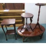 A 20th century mahogany oval coffee table,mahogany circular two tier occasional table,another two