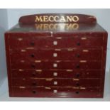 A six drawer Meccano collectors cabinet, with contents, 58cm wide x 38cm high Condition report: