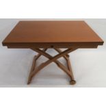 A modern cherrywood Calligaris Mascotte metamorphic dining/coffee table 71cm high x 141cm long x