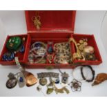 A jewellery box full of vintage costume jewellery, including retro items Condition report: Not