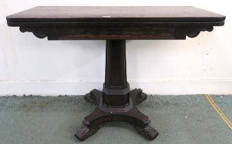 A Victorian rosewood foldover tea table on quatrefoil base with carved scroll feet 75cm high x 107cm