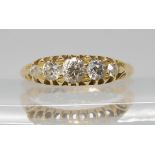 An 18ct gold five stone diamond ring, set with estimated approx 0.50cts of old cut diamonds, to