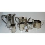 A tray lot of EP - four piece tea service, two cream jugs, caddy spoon, tongs etc. Condition report: