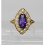 A 9ct amethyst and pearl cluster ring, finger size P, weight 4gms Condition report: Available upon