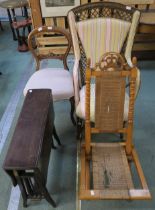 A 20th century beech folding chair with rattan seat, high back upholstered wicker armchair, mahogany