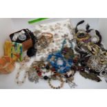 A collection of costume jewellery to include Two watches by Fossil Condition report: Not available