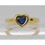 An 18ct gold heart shaped sapphire ring, with French eagles head hallmarks, size N, weight 3.7gms