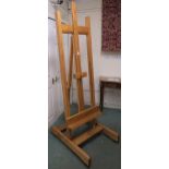 A 20th century oak adjustable easel 209cm high x 68cm wide x 92cm deep Condition report: Available