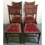 A set of four Victorian oak arts and crafts dining chairs 107cm high Condition report: Available