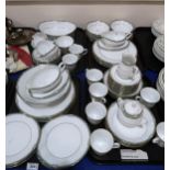 A Noritake Glenabbey dinner service comprising plates, cups, saucers, sugar bowls, cream jugs, sou