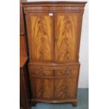 A 20th century mahogany drinks cabinet 153cm high x 72cm wide x 46cm deep Condition report: