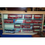 Five display cases of model buses and a box of various model buses Condition report: Available