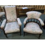 A Victorian mahogany framed slipper armchair with floral upholstery and a Victorian mahogany