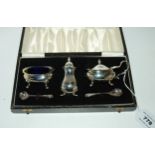 A cased three piece silver condiment set, Birmingham 1981 Condition report: Available upon request