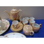 A Maling teapot, dish and plate all decorated with Italian scenes, a Wedgwood Newport teaset and