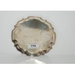 A silver card tray, Birmingham 1966 circular with scalloped rim 15.5 cm dia. 115 grams Condition