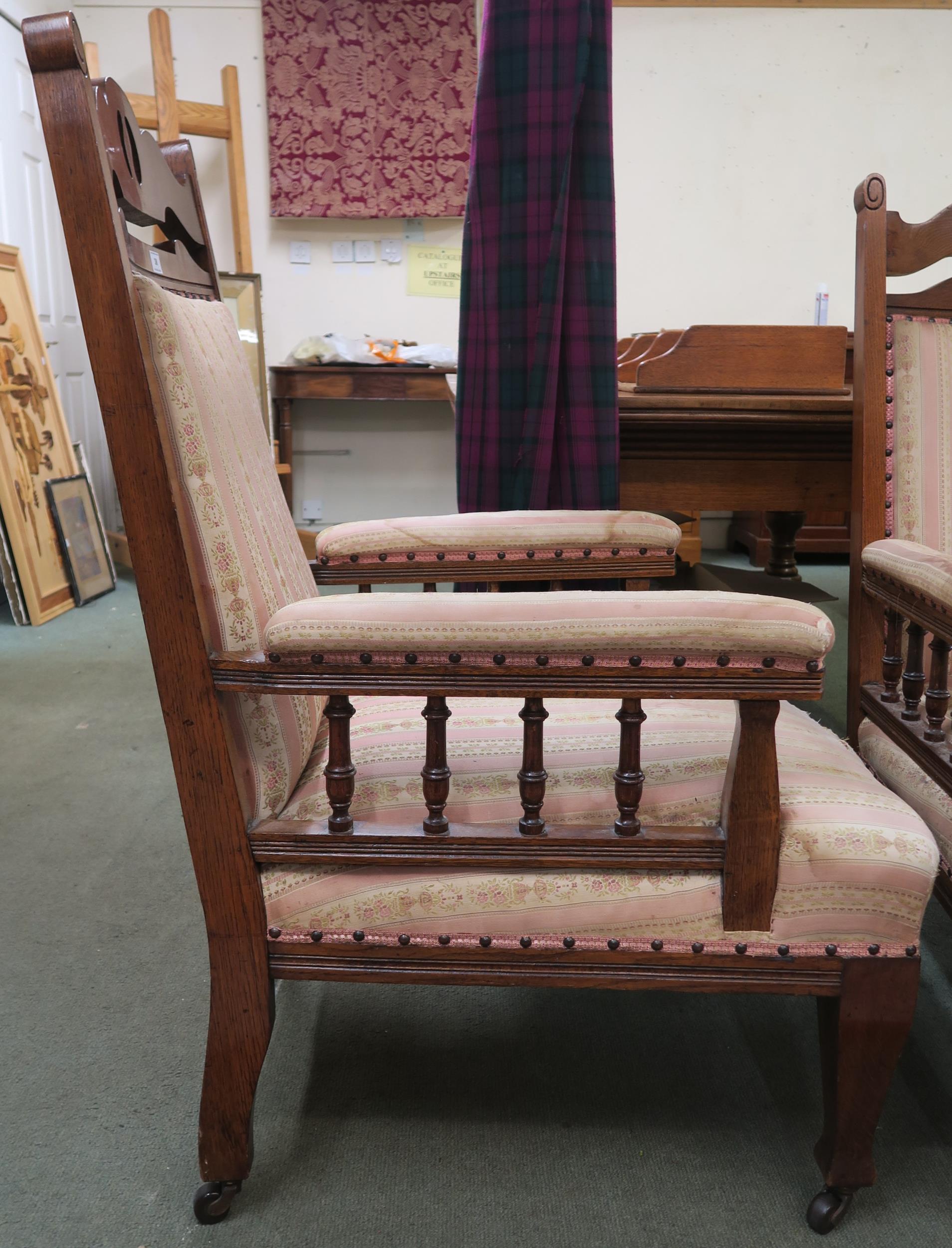 A pair of Victorian oak arts and crafts upholstered armchairs 108cm high Condition report: Available - Image 3 of 5