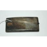 A silver card case London 1935 rectangular curved body with engine turned decoration monogrammed "