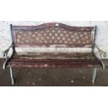 A contemporary garden bench with cast metal ends Condition report: Available upon request