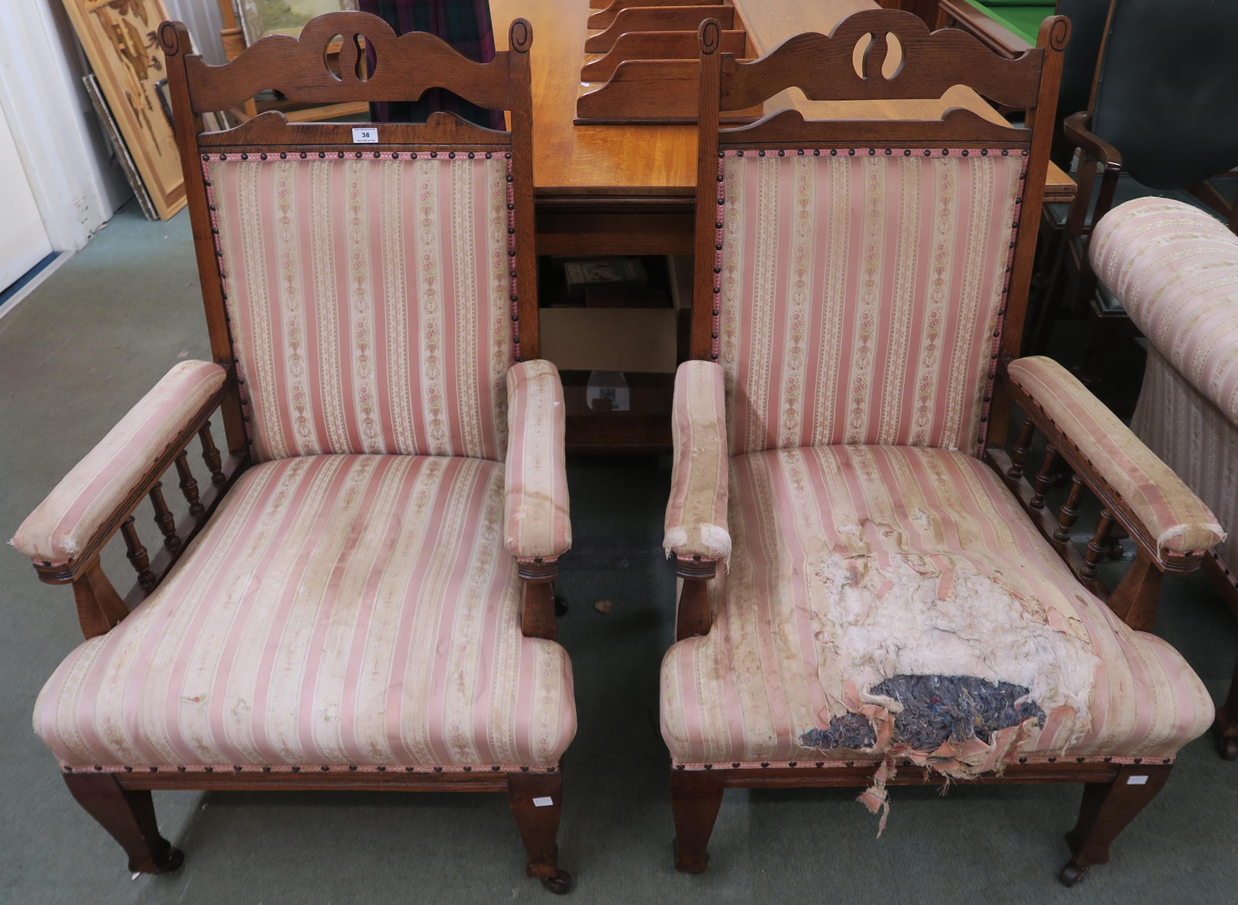 A pair of Victorian oak arts and crafts upholstered armchairs 108cm high Condition report: Available