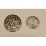 A Queen silver half crown 1708 with a Queen Elizabeth The First hammered silver sixpence 1561