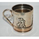 A silver christening mug, Birmingham 1905 of cylindrical form with applied figure dancing and