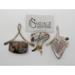 Three pendants by American designer Jeweller Greg Sandage of Virginia, with paperwork, the