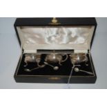 A cased three-piece silver condiment set, Dublin 1932 Condition report: Available upon request