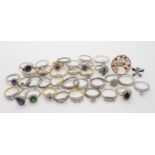 A collection of silver and costume gem set rings Condition report not available for this lot.