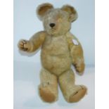 A vintage Teddy bear with growler, lacking eyes, 60cm long Condition report: Available upon request