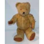 A vintage centre seam Teddy bear with growler, 58cm long Condition report: Available upon request