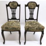 A pair of Victorian mahogany dining chairs with tapestry upholstery seats (2) Condition report: