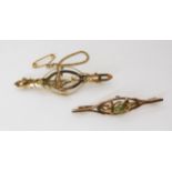 A 9ct gold pearl set swallow brooch, together with a 9ct peridot brooch, weight combined 5gms