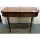 A Victorian mahogany fold-over tea table with single drawer on turned supports, 73cm high x 99cm