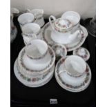 A Paragon Belinda pattern tea set comprising six cups, six saucers, six side plates, tea pot,