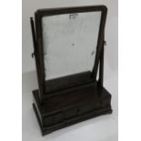 A Early Victorian mahogany three drawer dressing mirror Condition report: Available upon request