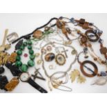 A silver retro necklace, and a collection of costume jewellery in a wooden box A condition report is
