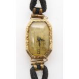 A French 18ct gold cased ladies vintage watch, weight including mechanism and strap 8.4gms Watch has