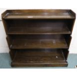 A 20th century oak waterfall front open bookcase, 94cm high x 102cm wide x 33cm deep Condition
