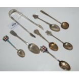 A small quantity of assorted silver spoons and a pair of silver tongs, 154 grams Condition report: