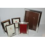 A lot comprising Five assorted Italian silver mounted photo frames, the smallest 15.5 x 12cm,