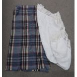 A linen tablecloth and a tartan blanket Not available for this lot