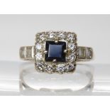 An 18ct white  gold blue gem and diamond square shaped cluster ring, finger size P1/2, weight 4.8gms