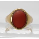 A 9ct gold carnelian signet ring, size V, weight 8.2gms Light general wear