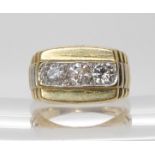 A 9ct gold gents three stone diamond ring set with estimated approx 1.50cts of brilliant cut