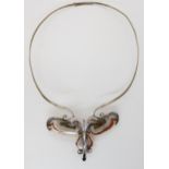 A retro silver moth necklace, the wings are made from slices of agate, with makers stamp possibly