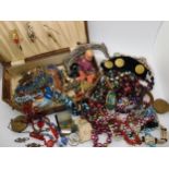 Deco beads, a glass Scotty dog bracelet, early plastic brooches and other items Condition report not