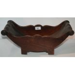 A mahogany cheese coaster on brass castors, 42cm wide Condition report: Available upon request