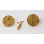A pair of 14k gold Chinese symbol cufflinks (one af) weight 9.8gms Condition report: Available